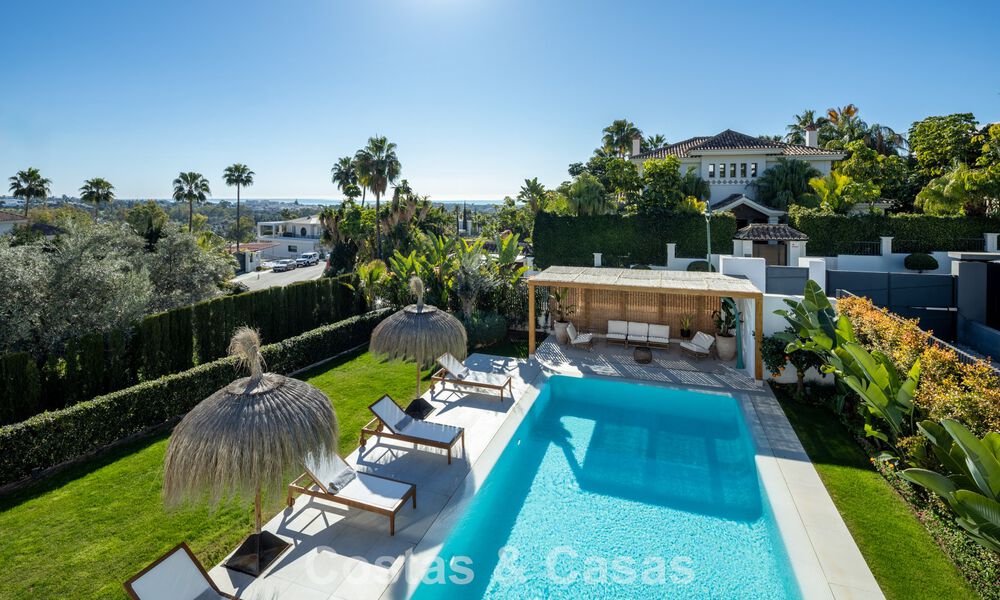 Modernistische luxevilla met zeezicht te koop in een geprivilegieerde villawijk in Nueva Andalucia, Marbella 778290