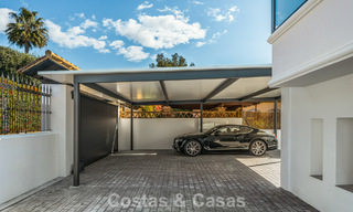 Verfijnde luxevilla in moderne mediterrane bouwstijl te koop met zeezicht in een gated complex op Marbella’s Golden Mile 778758 