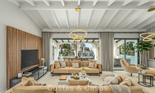 Verfijnde luxevilla in moderne mediterrane bouwstijl te koop met zeezicht in een gated complex op Marbella’s Golden Mile 778761 