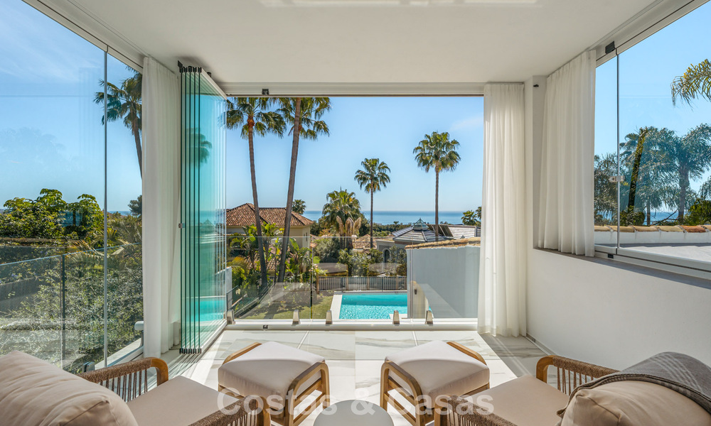 Verfijnde luxevilla in moderne mediterrane bouwstijl te koop met zeezicht in een gated complex op Marbella’s Golden Mile 778766