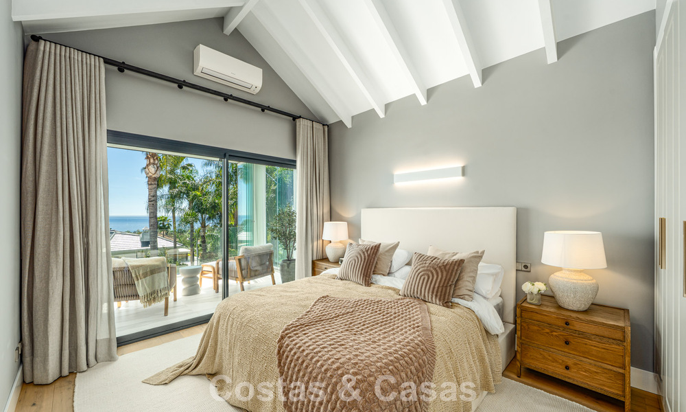 Verfijnde luxevilla in moderne mediterrane bouwstijl te koop met zeezicht in een gated complex op Marbella’s Golden Mile 778769