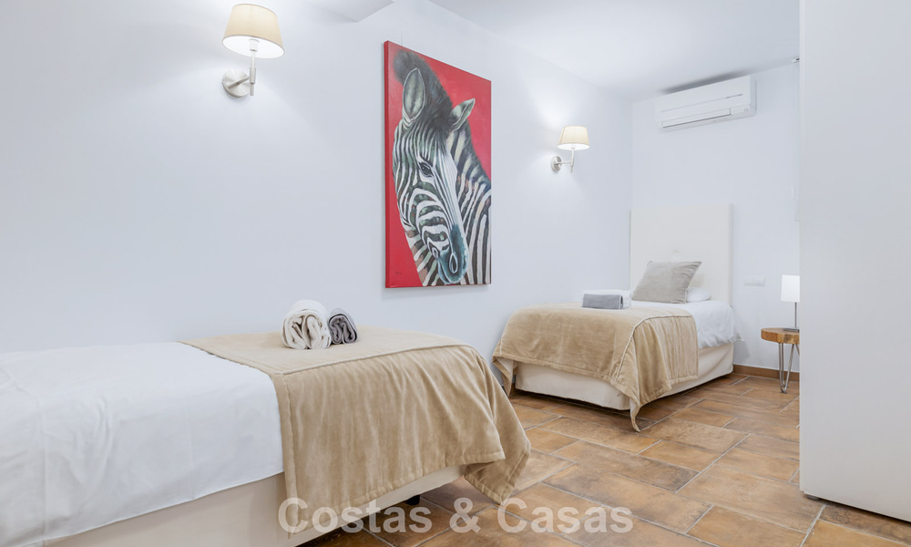 Ruim rijhuis te koop met zeezicht in een omheinde urbanisatie in de heuvels van Marbella - Benahavis 778946