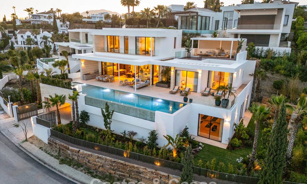High-end luxevilla met panoramische vergezichten te koop in een golfresort op de Golden Mile in Benahavis - Marbella 780114
