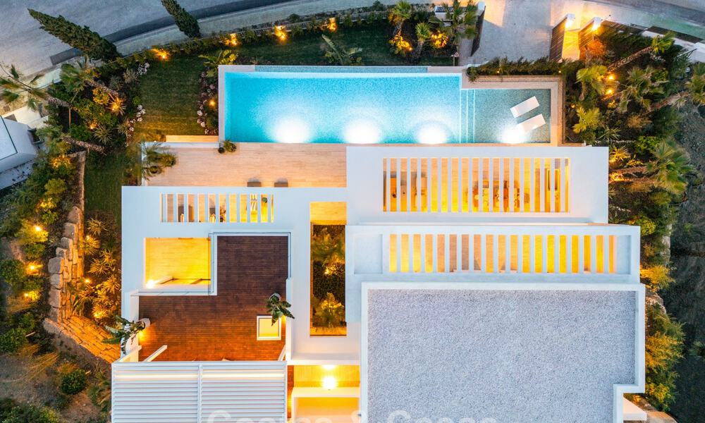 High-end luxevilla met panoramische vergezichten te koop in een golfresort op de Golden Mile in Benahavis - Marbella 780115