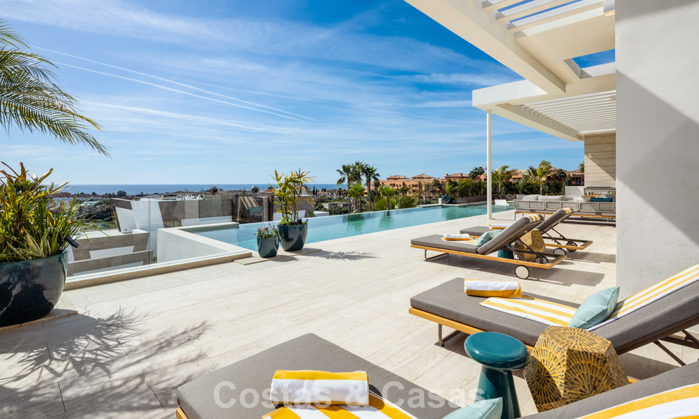 High-end luxevilla met panoramische vergezichten te koop in een golfresort op de Golden Mile in Benahavis - Marbella 780128