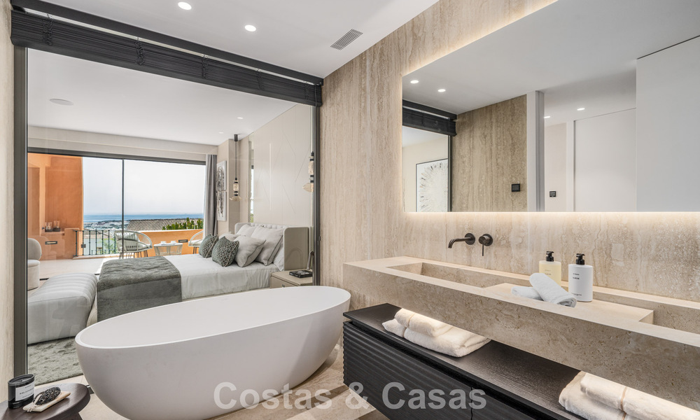 Eersteklas appartement met panoramisch zeezicht te koop in Nueva Andalucia’s golfvallei, Marbella 780283