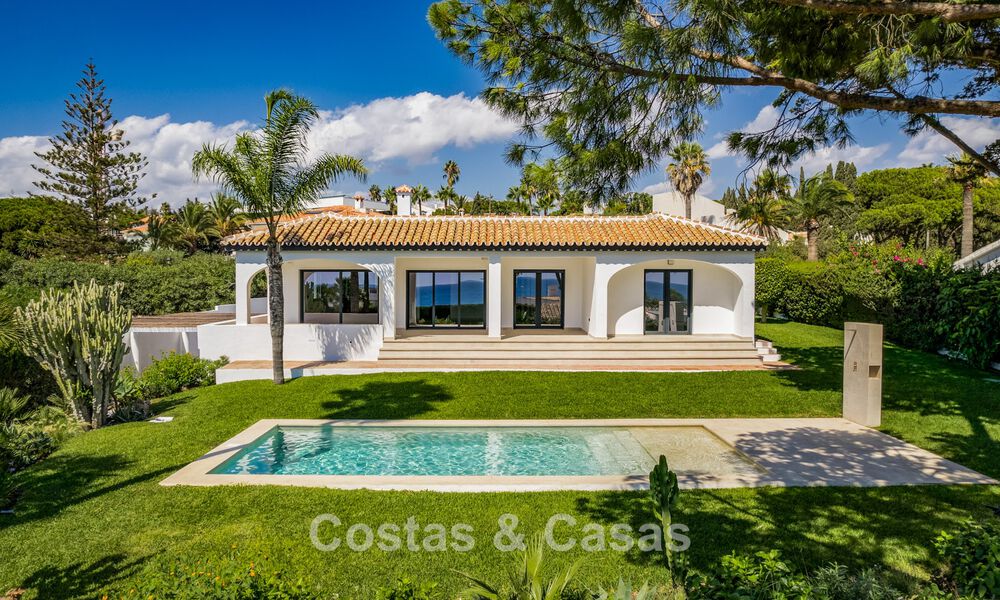 Gelijkvloerse luxevilla met zeezicht te koop nabij het strand en golfbaan van Mijas Costa, Costa del Sol 781239