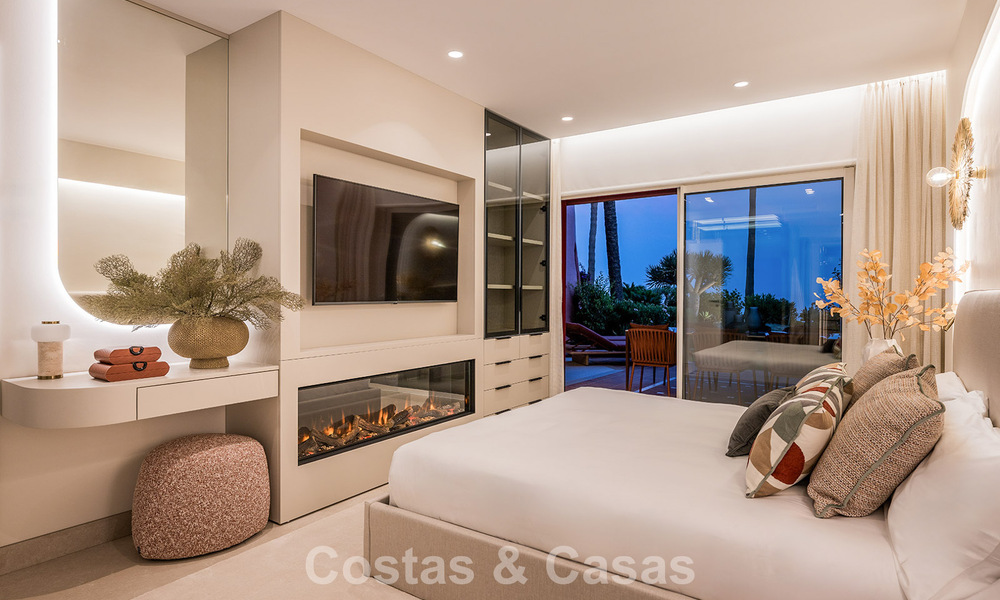 Hoogwaardig gerenoveerd tuinappartement met open zeezicht te koop, eerstelijnsstrand tussen Marbella en Estepona 783442
