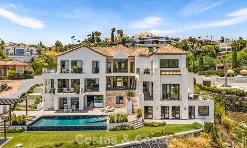 Eerstelijnsgolf villa met golf- en zeezicht te koop in het prestigieus 5* Golfresort in Marbella - Benahavis 783395