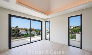 Instapklare, hedendaagse luxevilla te koop grenzend aan de golfbaan op de New Golden Mile tussen Marbella en Estepona 783296 