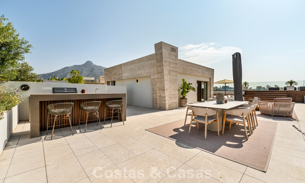 Instapklaar, high-end designwoning te koop, in een eersteklas resort-stijl complex op Marbella’s Golden Mile 782774