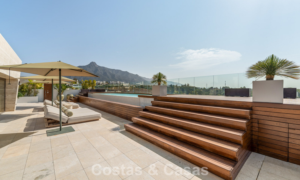 Instapklaar, high-end designwoning te koop, in een eersteklas resort-stijl complex op Marbella’s Golden Mile 782776
