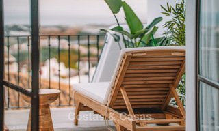 Instapklaar, ruime 3-slaapkamer rijwoning te koop met een eigentijds interieur en zeezicht in Marbella - Benahavis 782993 