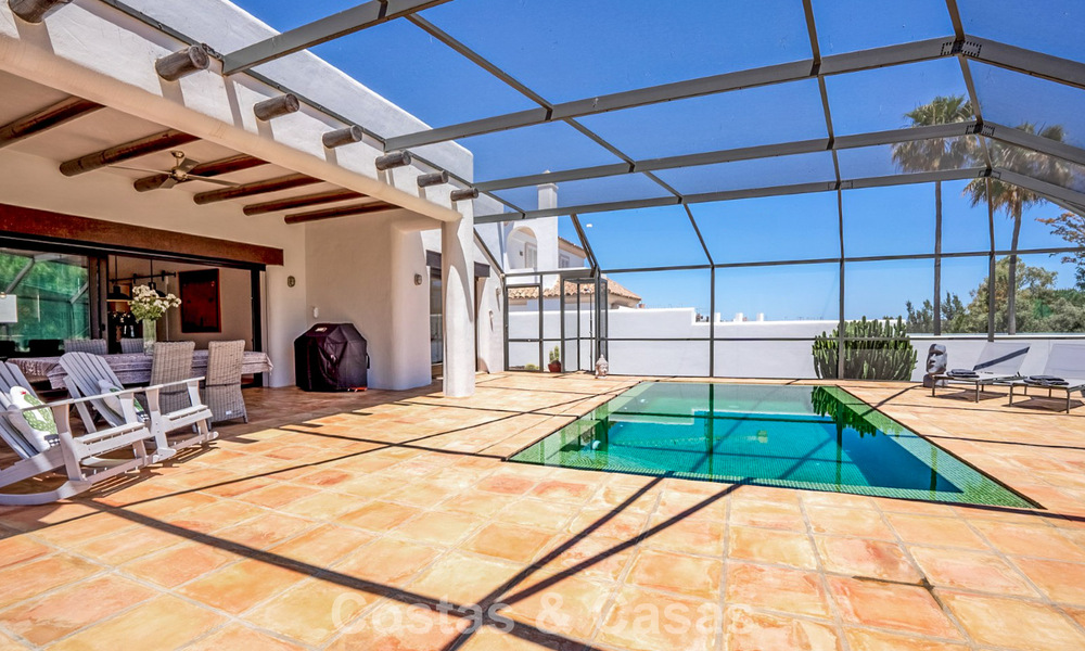 Instapklare, gelijkvloerse luxevilla te koop eerstelijns golf in een toonaangevend resort in Mijas, Costa del Sol 783956