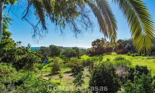 Uitmuntende luxevilla te koop in een tijdloze Andalusische architectuur, met zeezicht in Benahavis - Marbella 786054 