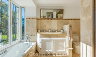 Uitmuntende luxevilla te koop in een tijdloze Andalusische architectuur, met zeezicht in Benahavis - Marbella 786064 