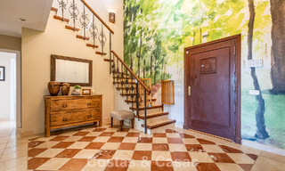 Uitmuntende luxevilla te koop in een tijdloze Andalusische architectuur, met zeezicht in Benahavis - Marbella 786069 