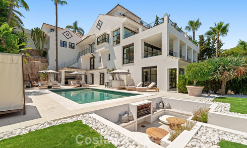 Statige luxevilla te koop in een begeerde villawijk in het hart van Nueva Andalucia, Marbella 790401