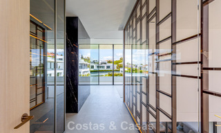 Exclusieve schakelvilla met zeezicht te koop in een vooruitstrevend complex met 24-uursbewaking op Marbella’s Golden Mile 787278 