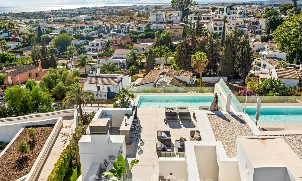 Minimalistische luxewoning met panoramisch zeezicht te koop in een prestigieus gated complex in Nueva Andalucia, Marbella 788606