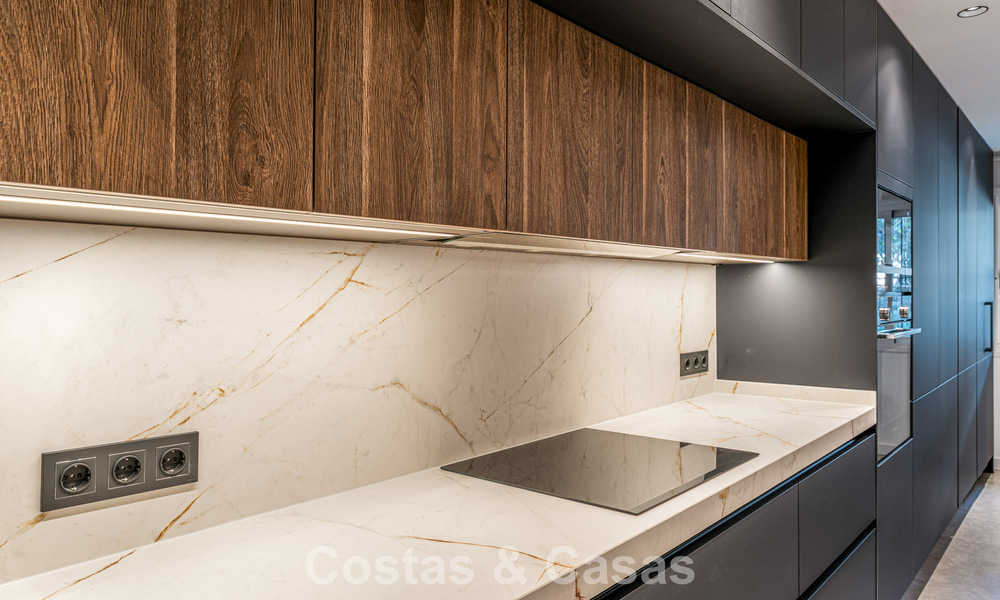 Modern gerenoveerd appartement te koop in een schitterend Sierra Blanca complex op de Golden Mile in Marbella 790284