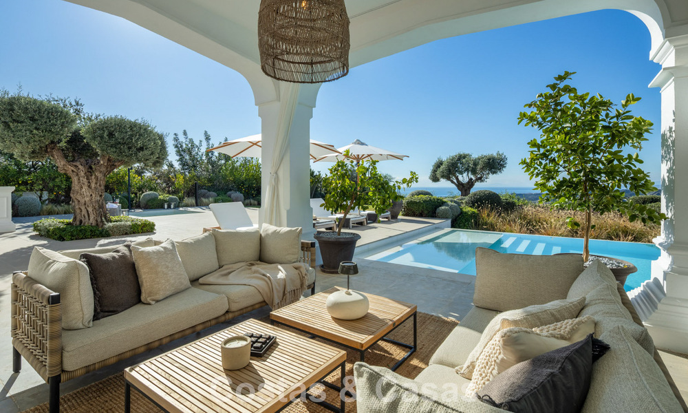 Mediterrane luxevilla met een klassieke architectuur te koop en zeezicht in het Marbella Club Resort in Benahavis 790339
