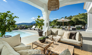 Mediterrane luxevilla met een klassieke architectuur te koop en zeezicht in het Marbella Club Resort in Benahavis 790368 