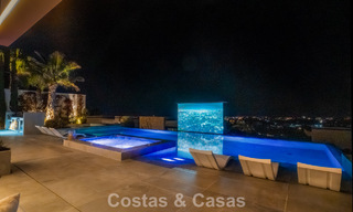 Luxevilla met geavanceerd design te koop met panoramisch zeezicht, binnen een prestigieus golfresort, Marbella - Benahavis 791079 