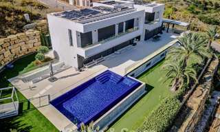 Gloednieuwe, moderne luxevilla met zeezicht te koop in een golfresort in Mijas, Costa del Sol 791692 