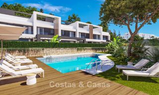 Eigentijdse townhouses met hedendaags ontwerp te koop in een golfomgeving van Mijas Costa, Costa del Sol 791820 