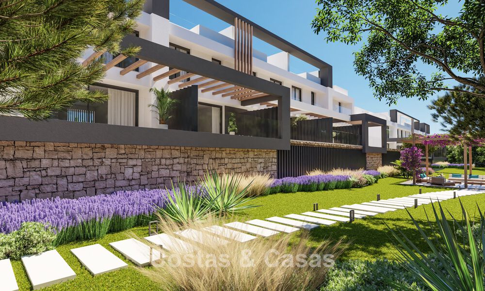 Eigentijdse townhouses met hedendaags ontwerp te koop in een golfomgeving van Mijas Costa, Costa del Sol 791830