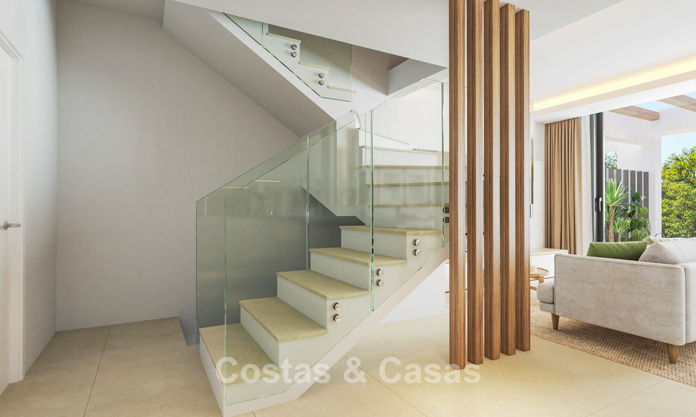 Eigentijdse townhouses met hedendaags ontwerp te koop in een golfomgeving van Mijas Costa, Costa del Sol 791833