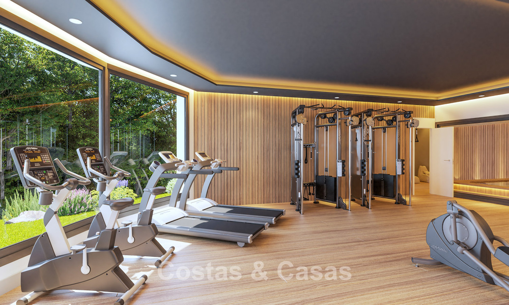 Eigentijdse townhouses met hedendaags ontwerp te koop in een golfomgeving van Mijas Costa, Costa del Sol 791835