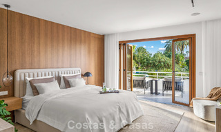 Elegant duplex appartement met privétuin te koop, direct aan de golfbaan in Nueva Andalucía, Marbella 793125 