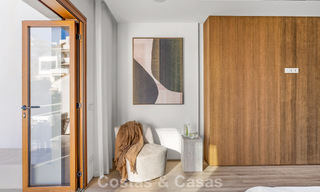 Elegant duplex appartement met privétuin te koop, direct aan de golfbaan in Nueva Andalucía, Marbella 793127 