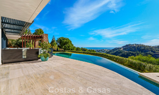 Moderne architecturale villa met zeezicht en een professionele gym te koop in El Madroñal, Benahavís - Marbella 793730 