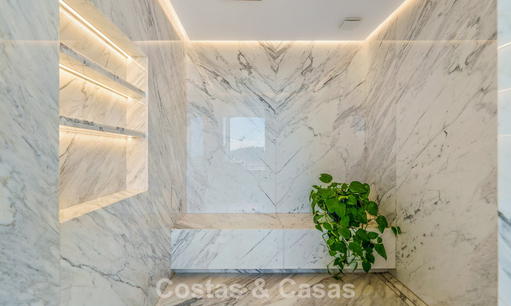 Moderne architecturale villa met zeezicht en een professionele gym te koop in El Madroñal, Benahavís - Marbella 793755