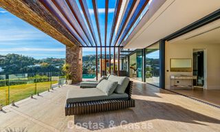 Moderne architecturale villa met zeezicht en een professionele gym te koop in El Madroñal, Benahavís - Marbella 793762 