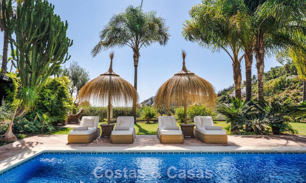 Elegante, Andalusische villa met panoramisch zeezicht te koop in El Madroñal, Benahavís - Marbella 793832