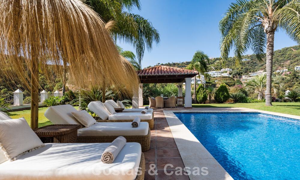 Elegante, Andalusische villa met panoramisch zeezicht te koop in El Madroñal, Benahavís - Marbella 793833