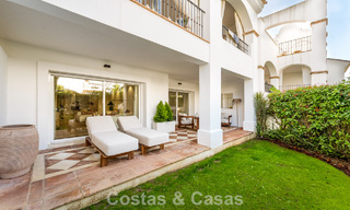 Stijlvol appartement met privétuin te koop in een gated community in Sierra Blanca, Marbella 793909 