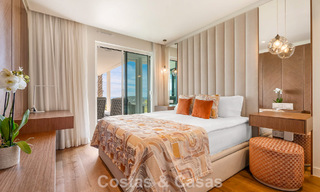 Modern, luxueus tuinappartement te koop met panoramisch zicht op de kust i/e gated boutique complex nabij Marbella stad 794496 