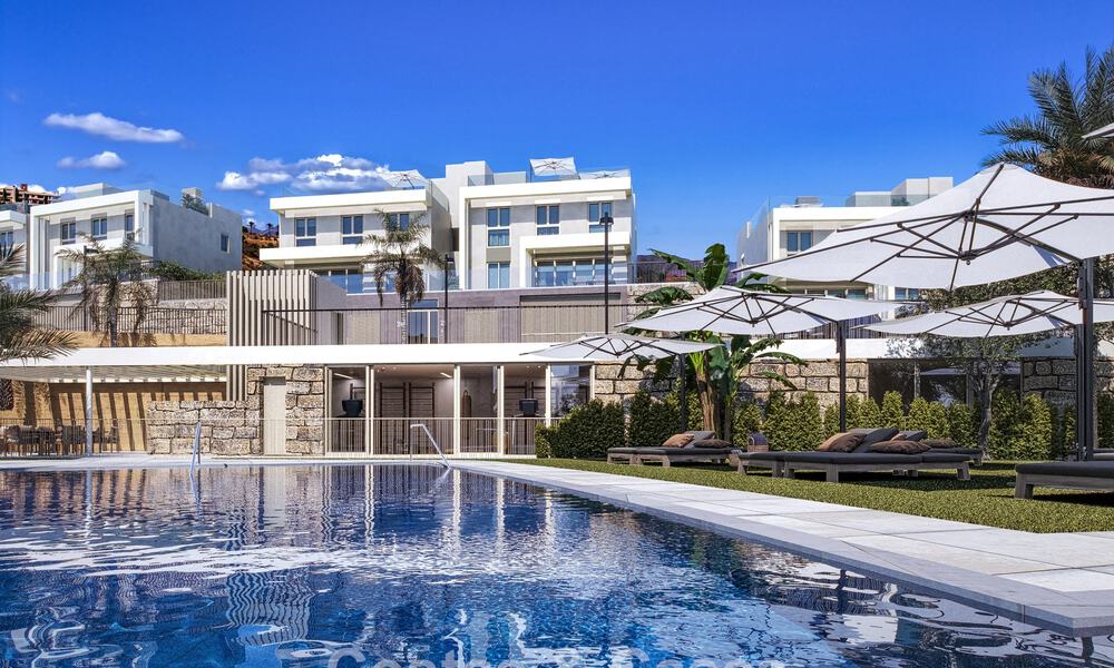 Exclusieve, geschakelde villa’s met zeezicht te koop in een begeerde golfomgeving in Mijas, Costa del Sol 795298