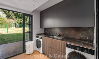 Exclusieve, architecturale villa met panoramisch golf- en zeezicht te koop in Nueva Andalucia, Marbella 796354 