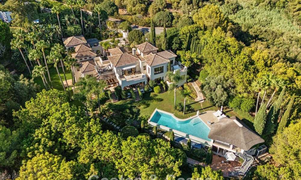 Opmerkelijke, Spaanse luxevilla met zeezicht te koop in een groene oase aan de Golden Mile van Marbella 798179