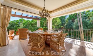 Opmerkelijke, Spaanse luxevilla met zeezicht te koop in een groene oase aan de Golden Mile van Marbella 798195 