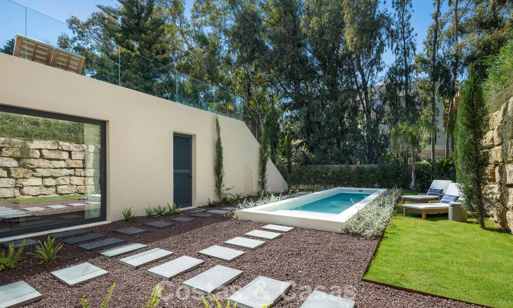 Geavanceerde designvilla te koop op een steenworp van de golfbaan, in het hart- van Nueva Andalucia, Marbella 798464