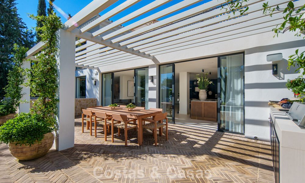 Instapklare, hedendaagse Mediterrane villa te koop grenzend aan de golfbaan van Las Brisas in Nueva Andalucia, Marbella 799123