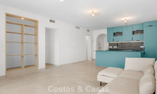Elegante gelijkvloers appartement met zeezicht in Nueva Andalucia, op wandelafstand van Puerto Banus, Marbella 799778 