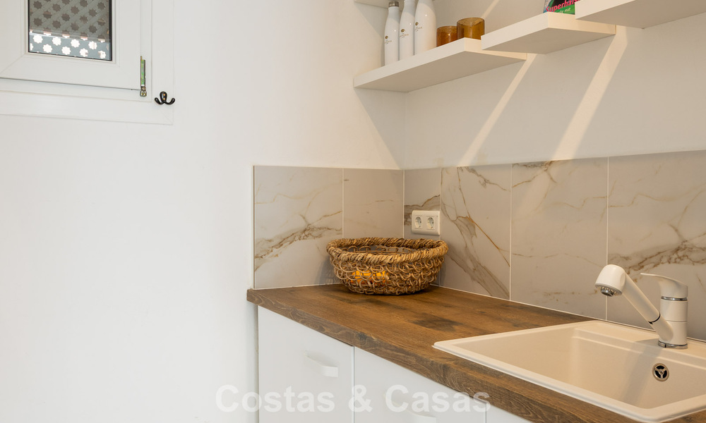 Prachtig, eigentijds gerenoveerde, Andalusische villa met panoramisch zeezicht te koop in Sotogrande, Costa del Sol 799842